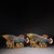 This is a matching pair of cloisonné enamel figurines in the form of large carp or koi fish, each featuring intricate...