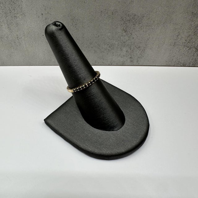 This striking Black Diamond Ring in 14kt Yellow Gold features 0.25 carat total weight (ctw) of natural round black...