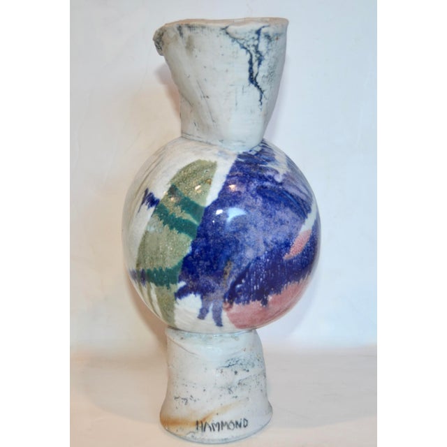 A modern studio ceramic art sculpture by artist Phyllis Hammond. A biomorphic abstract hand built vase form. 1970s...