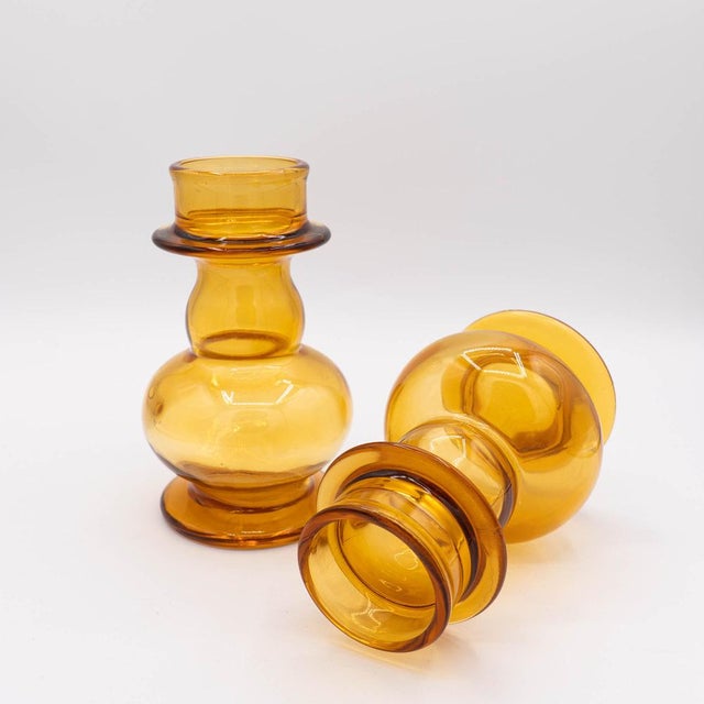 Introducing the Riihimäki Amber Hyacinth Glass Vase, a stunning example of mid-century Finnish design by renowned designer...