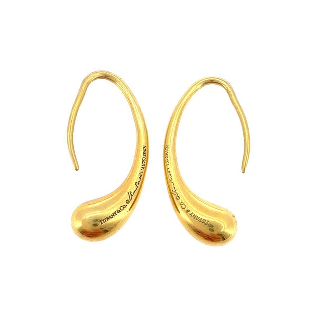 Vintage Elsa Peretti for Tiffany & Co. teardrop earrings crafted in 18K yellow gold, featuring the iconic fluid,...