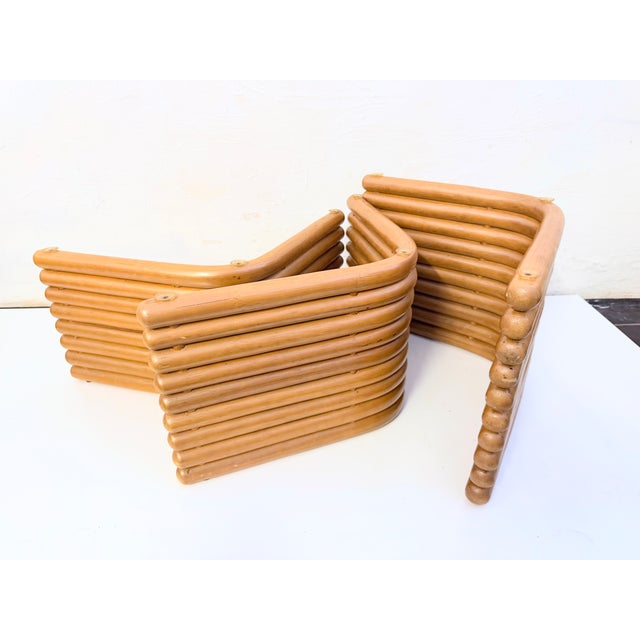 Three nesting tables from the 1960s or 70s, made in Italy, France, or Belgium. Curved rattan, glass. Good used condition....