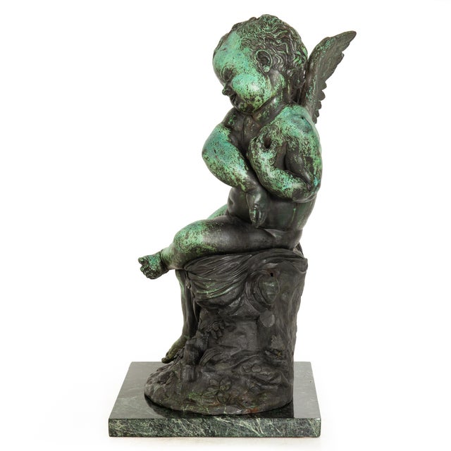 A COPPER ELECTROTYPE OF SEATED CUPID AFTER CHARLES GABRIEL LEMIRE Probably France, late 19th century 21" H x 10 1/2" D x...