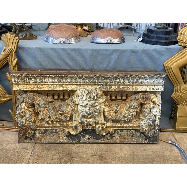 Cast iron figural frieze of Bacchus face from the facade of the 42nd and Vanderbilt, Warren and Wetmore building, circa...