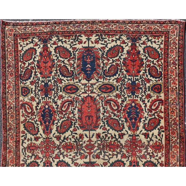 Measures: 4'4 x 6'2. Paisley design antique Persian Malayer rug in ivory, red, blue, brown. Keivan Woven Arts / rug...