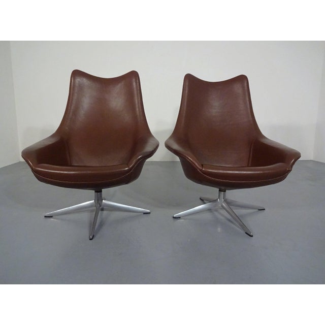 Rare Pirouette Swivel Easy chair designed by H.W. Klein for Bramin and made in Denmark. It is upholstered in fat brown...