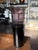 A signed Venini Murano vase in deep aubergine with flared lip and intricate details. Signed on the bottom.