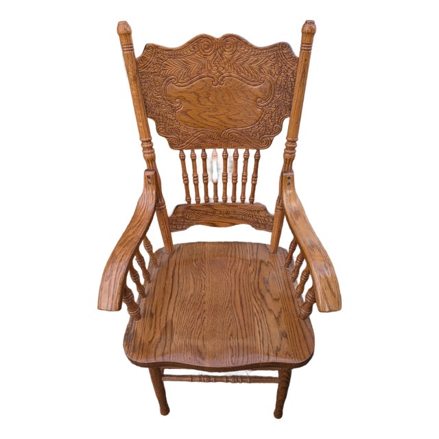 Mid-Century Carved Oak Press Back Arm Chair For Sale