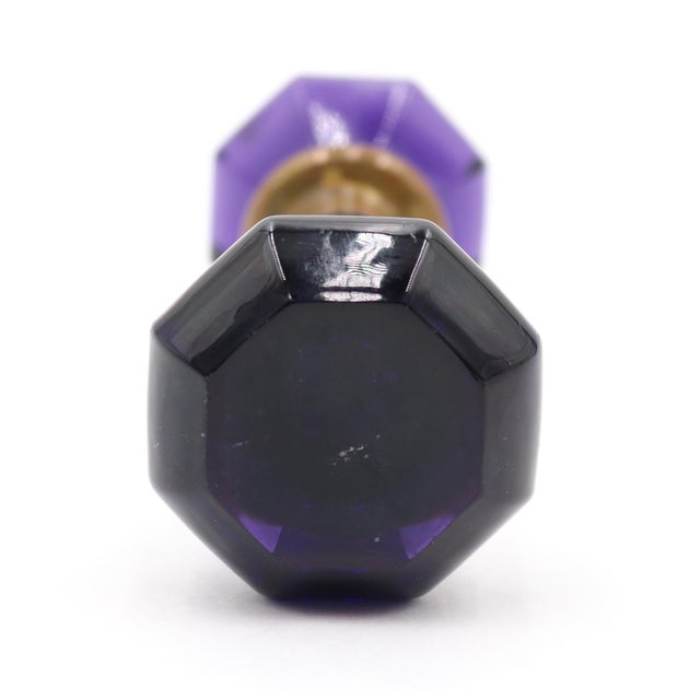 Vintage octagon shaped dark purple glass door knobs with a brass shank. Priced as a pair of knobs with a spindle. Good...