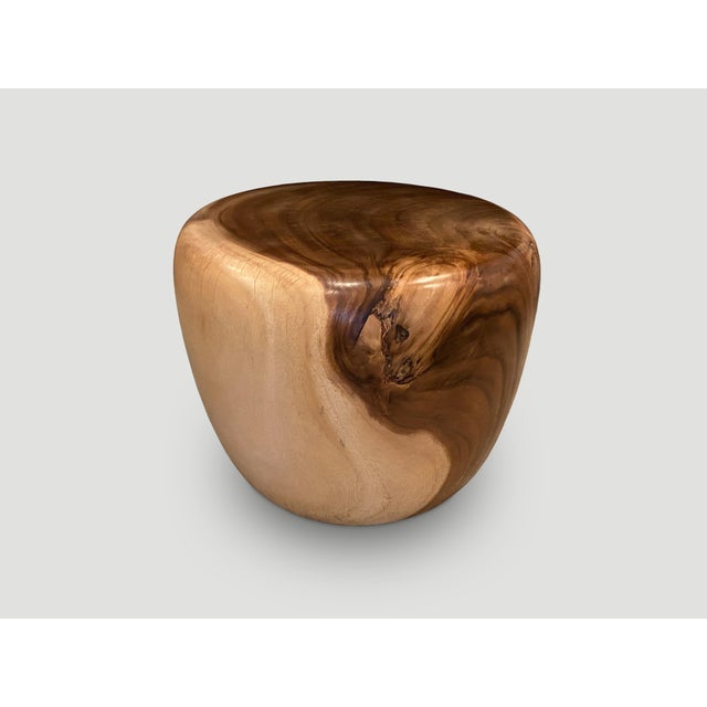 Beautiful wood grain on this reclaimed suar wood coffee table or side table. Hand carved into an impressive drum shape....