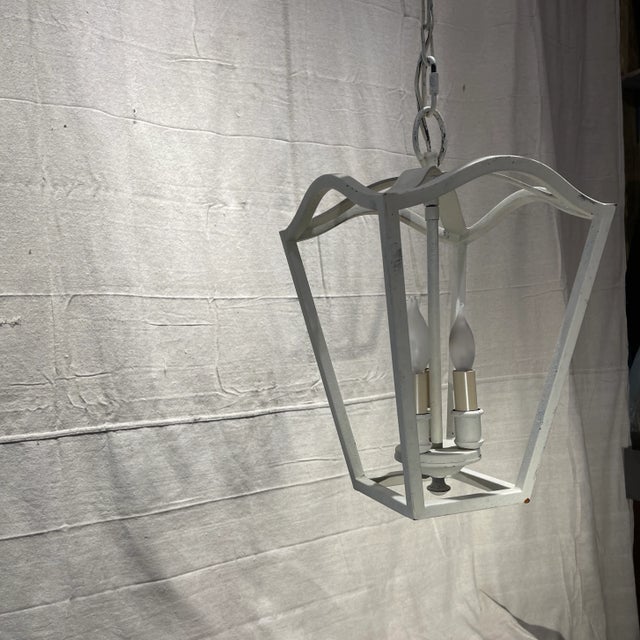 A nice distressed white painted lantern with a shaped form, would be great interior or exterior. We have 2 available and...
