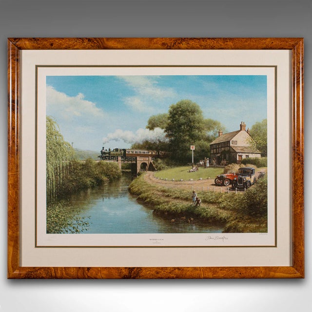 This is a vintage railway print. An English, framed steam train picture titled 'Riverside Local' by Don Breckon, dating to...