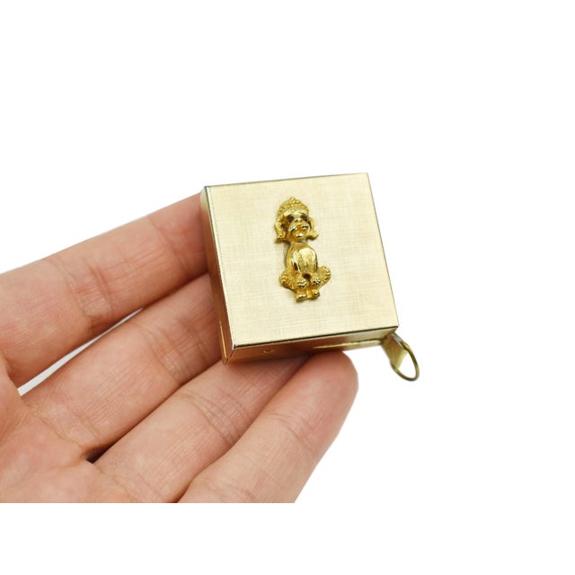 Mid 20th Century Gold-Tone Metal Small Tape Measure With Poodle Dog Design For Sale - Image 4 of 4