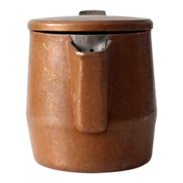 A handsome Sambonet copper creamer, circa 1963, with a distinctly modernist silhouette. The petite pitcher features a...