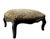 A charming late 18th century French carved wood footstool with a beautifully shaped frame and cabriole legs. The dark wood...