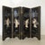 A vintage Chinese 4-panel mini folding screen featuring an elaborate black lacquered wood frame with brass hinges. The...