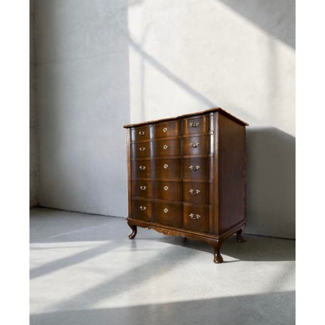 Bow-front chest of drawers | northern europe, c. 1930s–1950s oak dresser with cabriole legs and brass hardware bow-front...