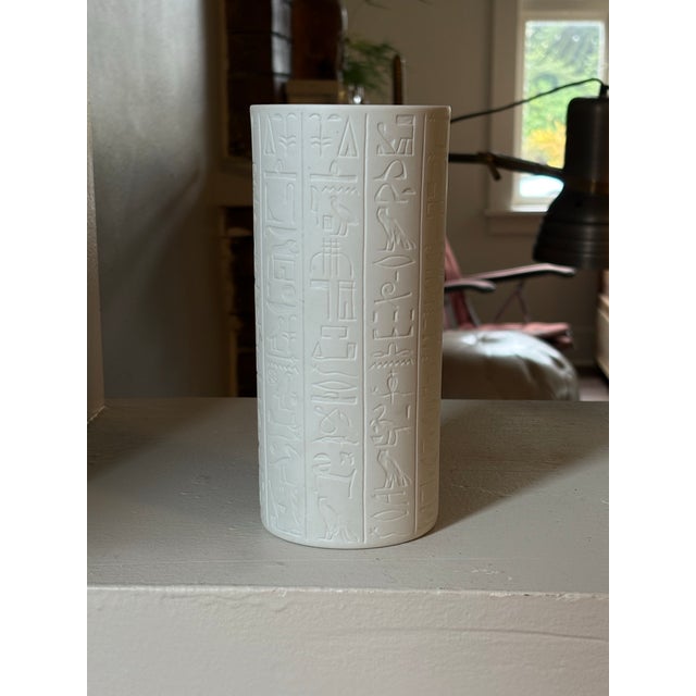 This white ceramic vase is part of the Brooklyn Museum Collection, produced by renowned Portuguese porcelain manufacturer...
