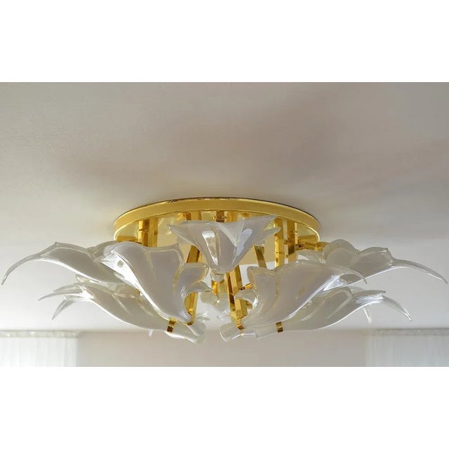 It can be a draft of the designer Franko Luce for Seguso Italy. The chandelier/ceiling light consists of a round ceiling...