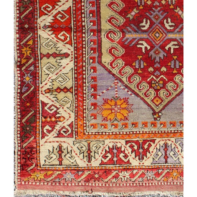 Measures: 3.3 x 3.9. Colorful early 20th century antique Turkish Oushak rug with Medallion in Purple. Keivan Woven Arts /...