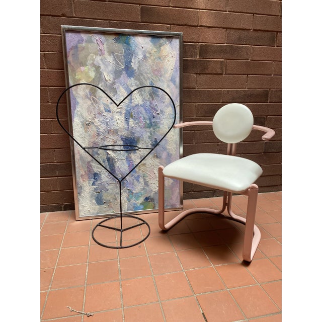 Whimsical black iron vintage sculptural heart shaped postmodern plant holder. 35” tall x 25.5” wide. Will accommodate a 9”...