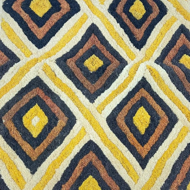 Handwoven Shoowa square textile from the Kuba people of the central Democratic Republic of the Congo. Known for their...