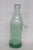 This Coca Cola Bottle was made by the J.S. Francis Bottling Company in the 1920s. Featuring a gorgeous green toned glass,...