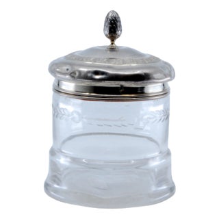 Glass Bottle with Embossed Silver Lid and Pine Cone-Shaped Handle For Sale