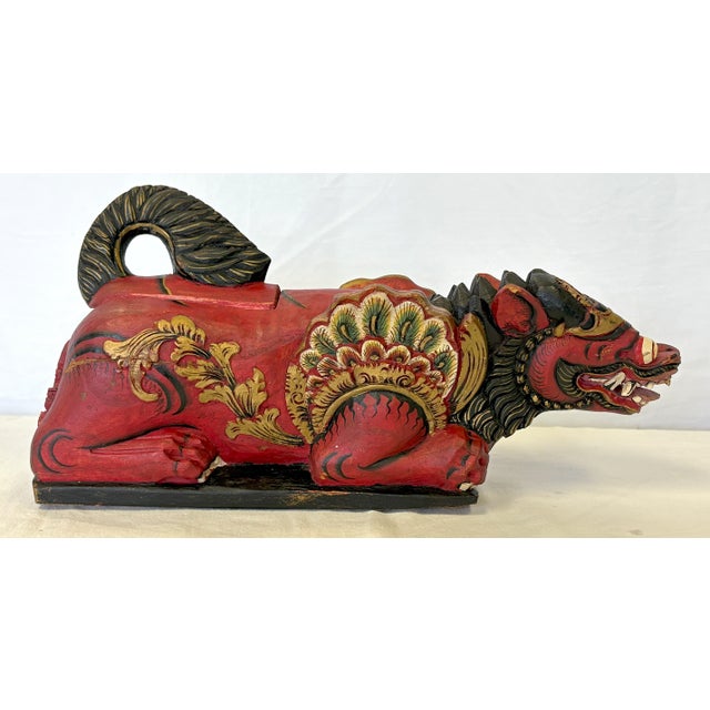 Wonderful Balinese carved wood lion box depicting Singa the Lion. The piece is made of hand carved wood painted with...
