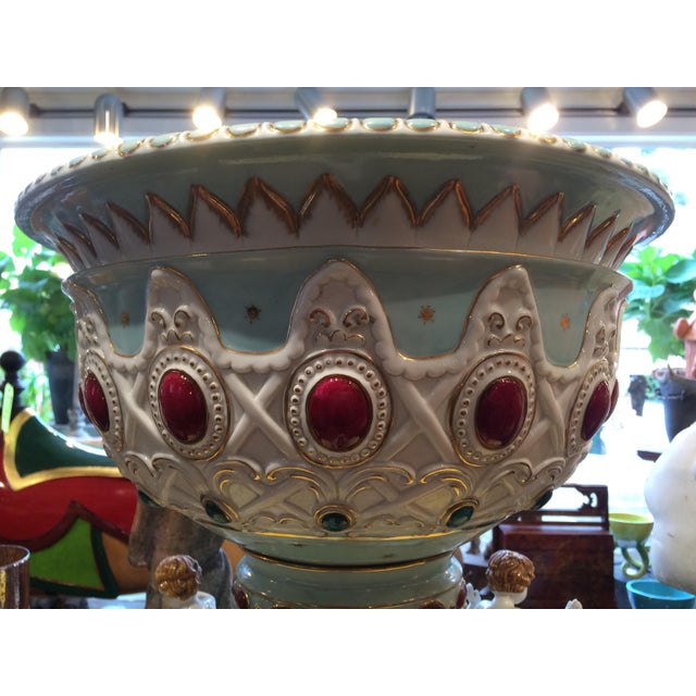 This is museum quality, monumental, fine porcelain, centerpiece urn from Dresden, Germany with Putti or Cherubs at the...