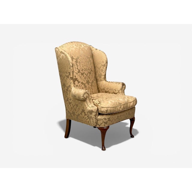 Queen Anne, Wingback Chair, Scalamandre Fabric, Mahogany, England, 19th c. A Queen Anne style wingback lounge chair having...