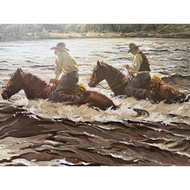This is a Robert Summers print from 1984 of two cowboys crossing a river on horseback entitled “High Water Crossing”. This...