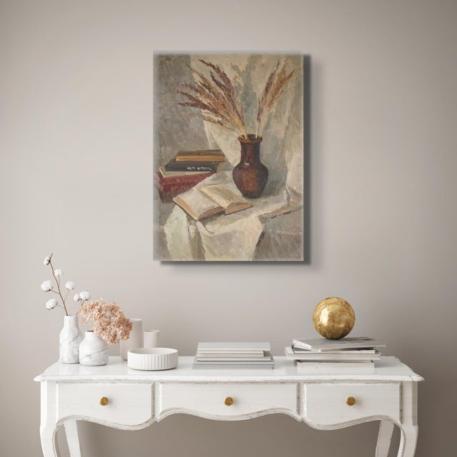 This still life is a delicate ode to the serene, subtle beauty of Autumn. The focal point is a vase abounding with a dried...