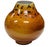 A Raymor 1950's Italian Modern art pottery vase with a distinctive bright amber glaze accented by abstract black glaze...