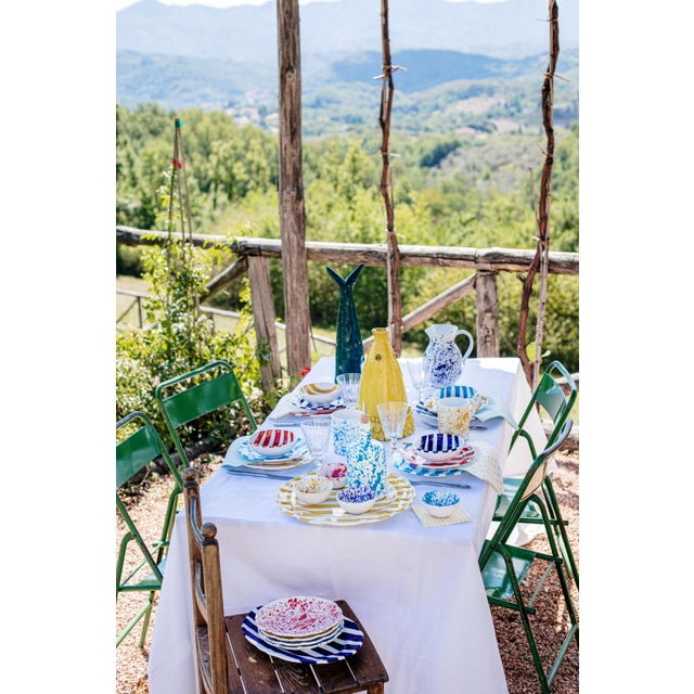 The Amalfitana Red Splatter Olive Oil Bottle pays homage to the Amalfi Coast's fresh seaside style, and its bold hues and...