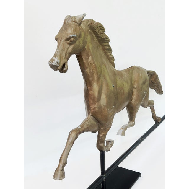 Antique 19thC "Ethan Allen" Full Bodied Copper Gold Painted Horse Weathervane C1890s. displayed on a new black iron base....