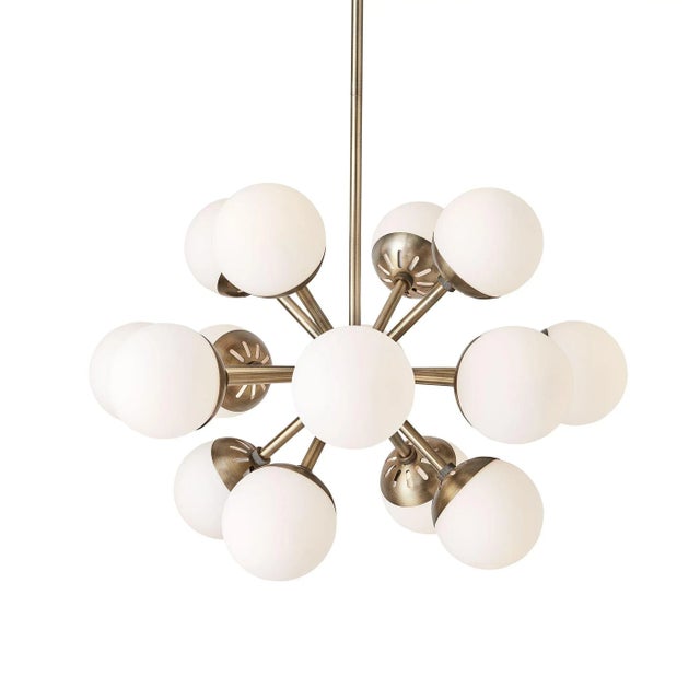 Designed With Mid-Century Roots A Sputnik Center Structure Finished In A Warm Antique Brass And Accented With 5" Matte...