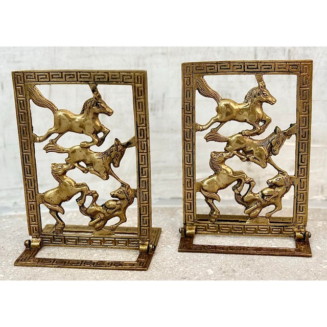Metal Vintage Chinoiserie Brass Horse Bookends With a Cut-Out Design of Galloping Horses Surrounded by a Greek Key Border-a Pair For Sale - Image 7 of 12
