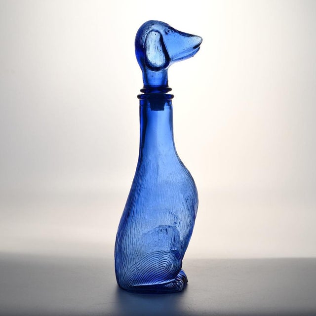 Dog-Shaped Carafe in Blue Glass from Empoli, 1960s, in Flawless conditions. Designed 1950 to 1959 This piece has an...