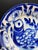 Antique blue and white pottery plate dating to the late 18th – early 19th century. The dish features hand-painted cobalt...