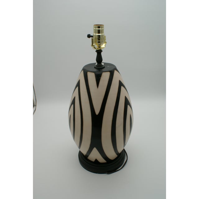 Add a touch of artisan elegance to your home with this stunning handcrafted lamp made from authentic Chulucanas pottery....