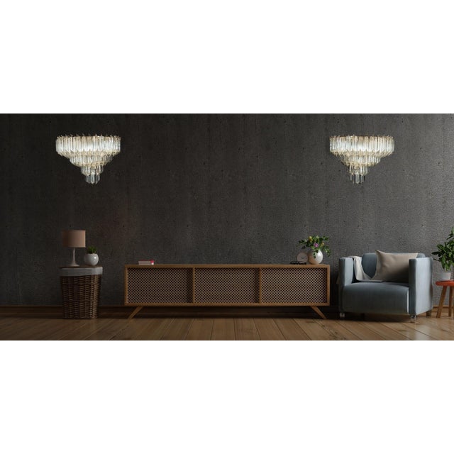 Fantastic pair of vintage Murano wall sconce made by 63 Murano crystal prism (quadriedri) for each applique in a chrome...