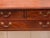 A good George III mahogany dressing table with a well-figured top above two short drawers over a single long drawer, all...
