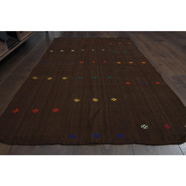 Vintage Turkish Hand-Knotted vintage rug is a semi-antique vintage runner rug. The '70s Eastern region of Turkey's unique...