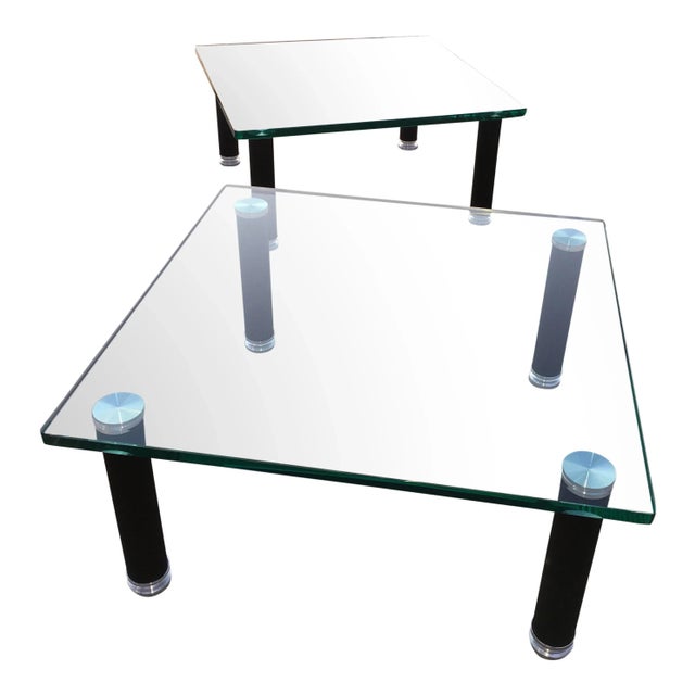 Pair of contemporary low side or small coffee tables, with anodized black steel legs, chrome mounts, bearing bottle green...