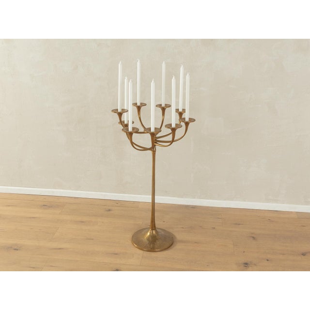 Brutalist candleholder by Michael Harjes from the 1970s. High-quality bronze frame with nine movable arms. Quality...