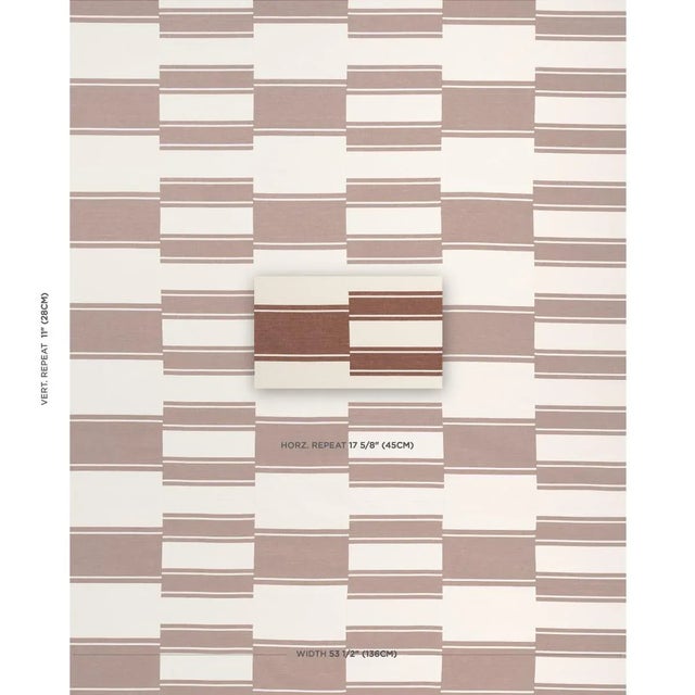 Nomad is comprised of woven medium and large-scale stripes that are cut into strips, then pieced together for handmade,...