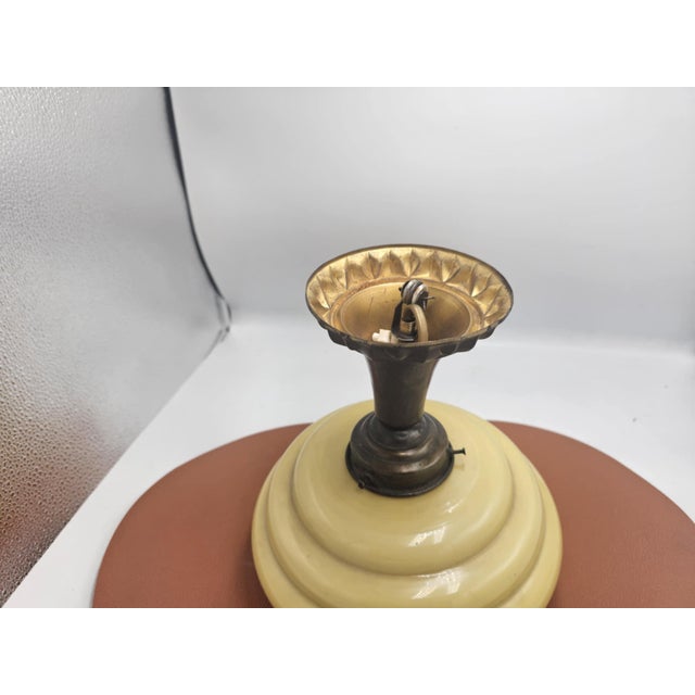 Pre-war brass ceiling lamp, Art Deco, dimensions height 22.5 cm. lampshade diameter 22 cm. European Plug (up to 250V).The...