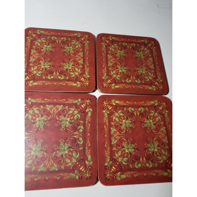 A set of six English square coasters traditional colors, made by Pimpernel. Would be great used for barware or everyday...