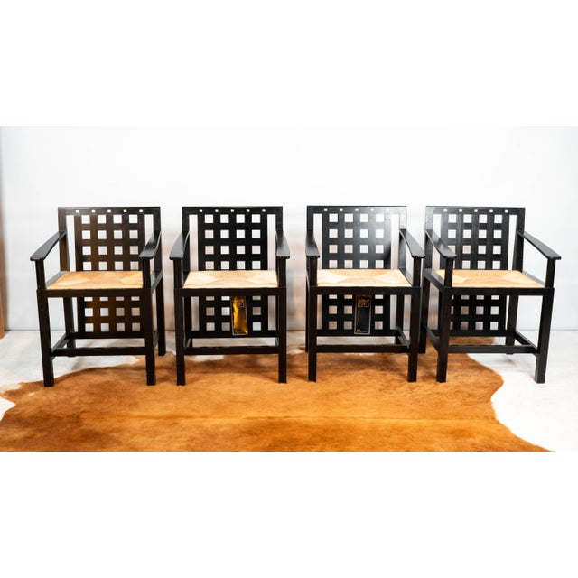 Cassina D.S.4 armchairs designed by Charles Rennie Mackintosh in 1918, set of 4, circa 1980s. Classic armchair with grid...